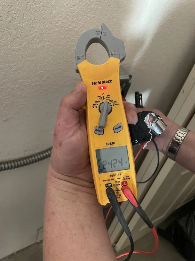 Voltage testing with clamp meter during Outlet Installation in Stockton